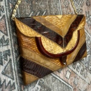 Vintage patchwork snakeskin clutch